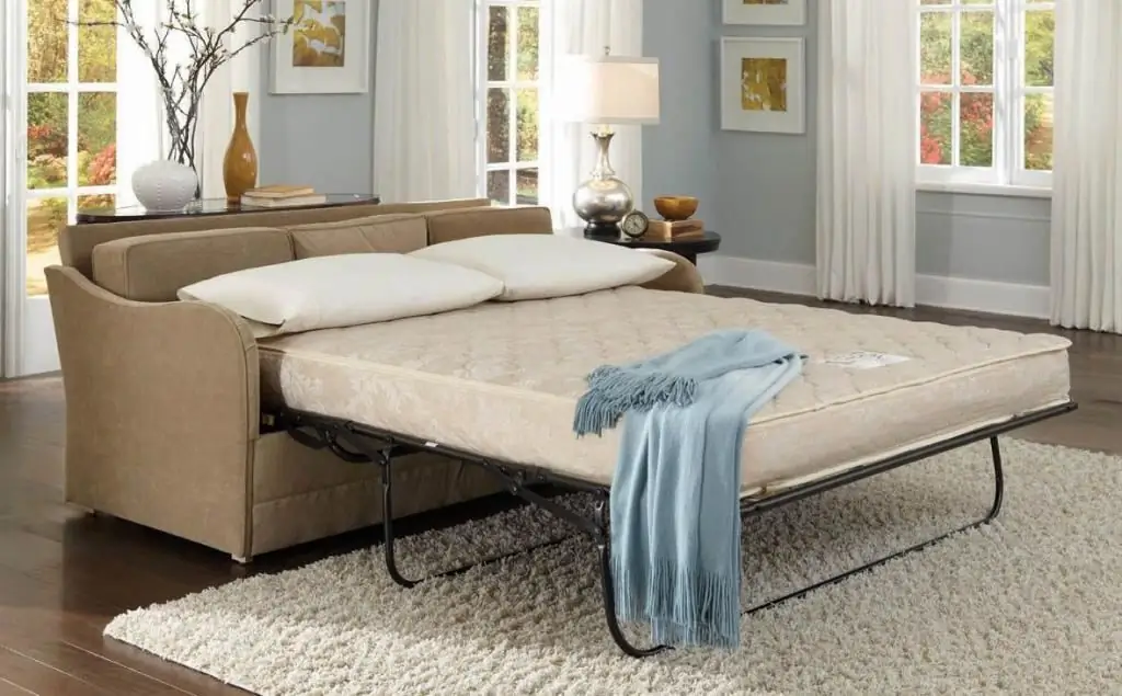 American folding bed in the design of the sofa