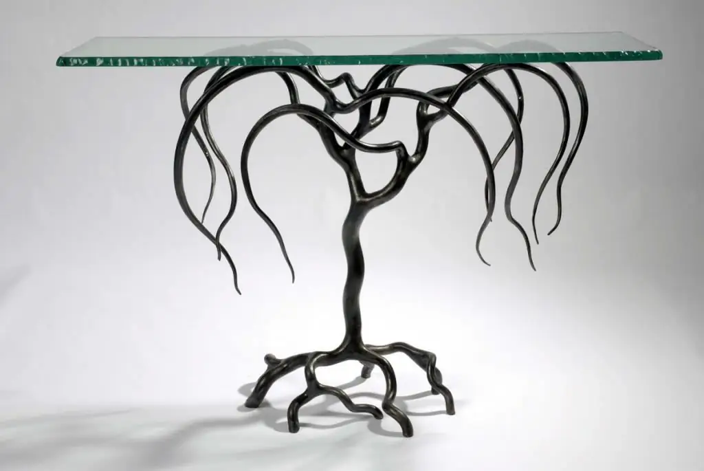 Forged console in the form of a tree