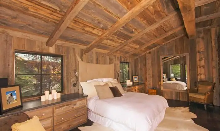 bedroom in a wooden house photo design