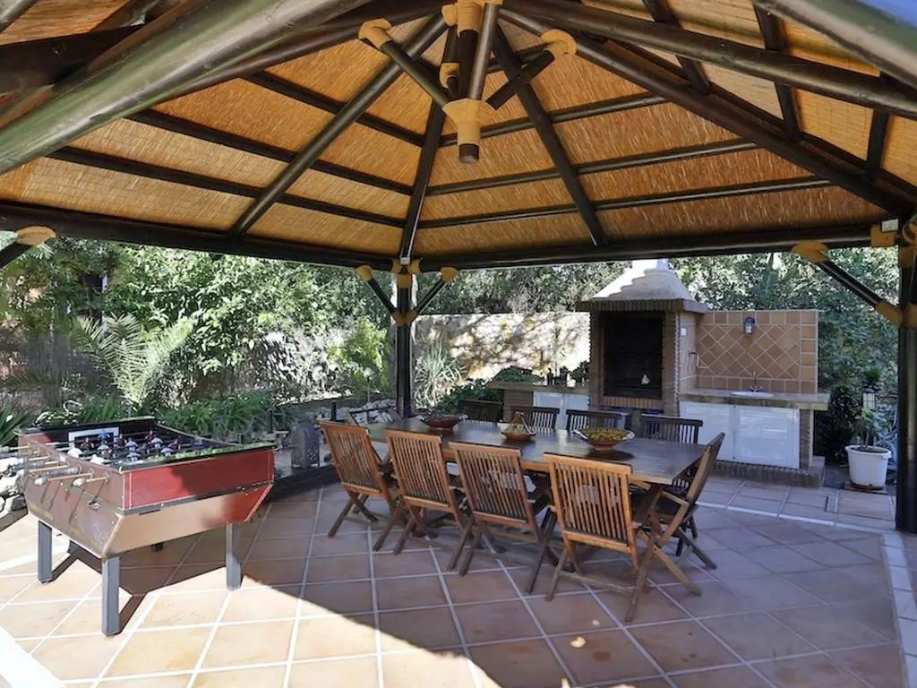 Gazebo with barbecue and smokehouse